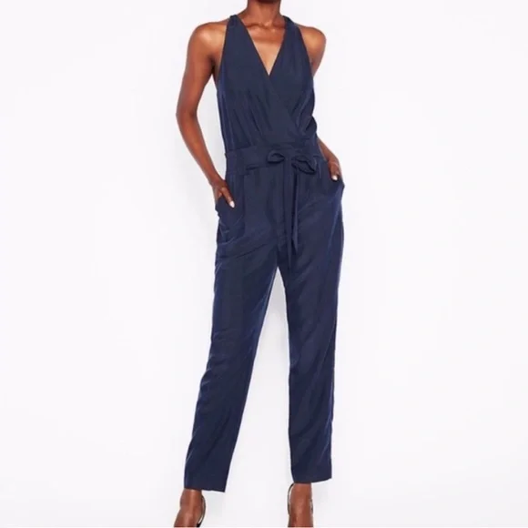 NEW EXPRESS Belted Surplice Jumpsuit in Navy Sz 6 - Picture 1 of 9
